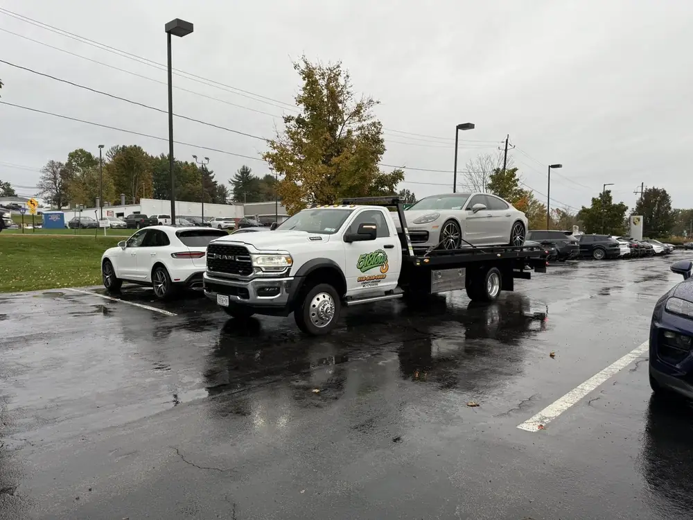 518 Tow flatbed making a dealership drop-off